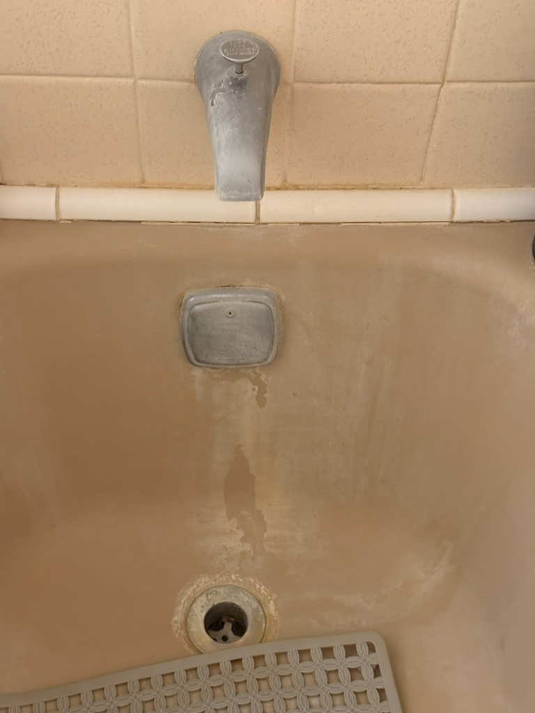 Hard water in Northern Illinois causing mineral staining on a bathtub fixture